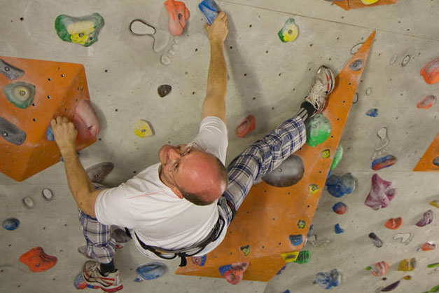 Image of a man climbing indoor rock climbing in Morzine